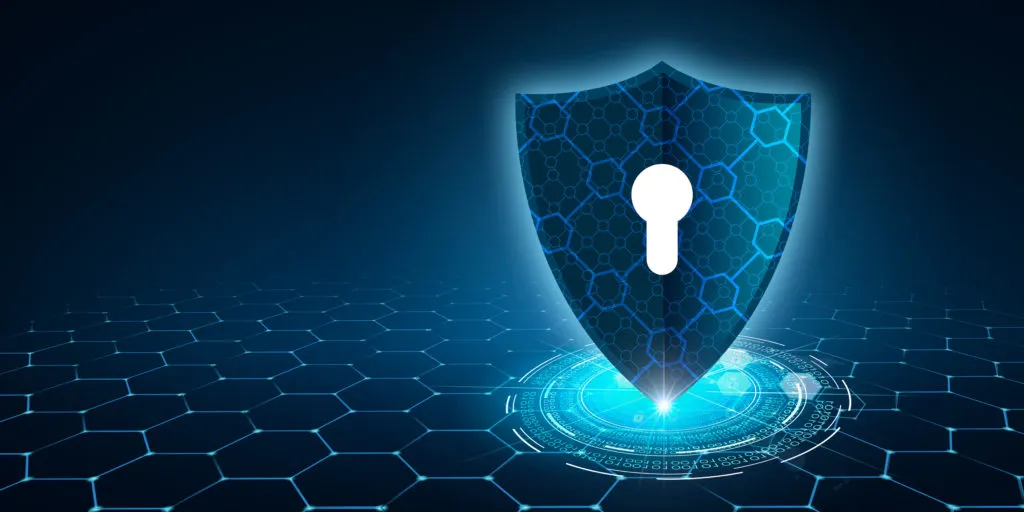 Digital shield with a keyhole above a glowing honeycomb platform